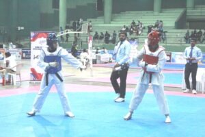 Radhika Sharma playing taekwondo Quarter final bout at All India Inter University Kurukshektra, Hariyana